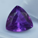 Loose Gemstone 7.45 Ct Trillion Cut Purple Tanzanite on White Background