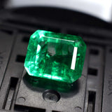Certified Green Emerald 8.60 Carat placed in black display box – Natural Colombian Origin