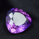 Natural Purple Tanzanite 7.20 Ct Certified Trillion Cut Loose Gemstone on Black Background