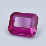 Certified 22.35 Ct pink ruby loose gemstone placed again on white background
