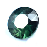 Natural certified sapphire, 5.40 carats, with a deep green color and a round shape.