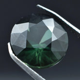 Natural Sapphire 5.40 Carat deep green round cut gemstone