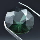Natural Sapphire 5.40 Carat deep green round cut gemstone