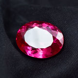 A large 26.25-carat bi-color sapphire, certified and ready for a custom jewelry setting.