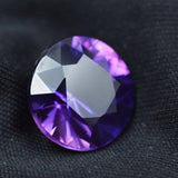 Loose 9.56 carat certified sapphire with a color-changing effect.