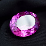 Pink gemstone on a black background
