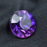 9.30 Ct Round Purple Tanzanite Loose Gemstone on Black Background - Eye Clean Clarity