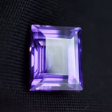 Certified natural emerald-cut purple sapphire, a color-change loose gemstone.