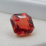 Square-cut orange sapphire, 8.56 carats, a certified loose gemstone.