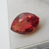 Marquise-cut orange sapphire, 10.52 carats, from Africa, a certified loose gemstone for a ring.