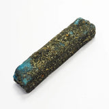 Rolled-up piece of material with blue and green hues on a white background