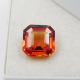 Certified natural orange sapphire, 8.52 carats, believed to promote overall well-being.