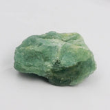 Green crystal rock on a white background