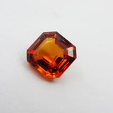 Certified 6.35ct square-cut orange sapphire.