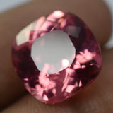 Square cushion-cut 10.22ct Padparadscha sapphire.