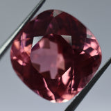 Square cushion-cut 10.22ct Padparadscha sapphire.