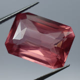 Emerald-cut 11.65 carat loose sapphire gemstone.