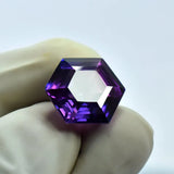 11.84 Ct Purple Sapphire Color Change Gem close-up view