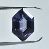 6.70 Ct Color-Change Alexandrite Held by Jewelry Tool – Fancy Shape Gemstone
