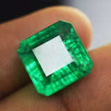 Emerald green gemstone square cut natural certified shown in hand – ideal for spiritual connection
