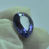 Natural Alexandrite 8.65 Ct Held Between Two Fingers – Pear Cut Color-Change Certified Gem