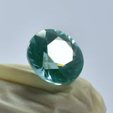7.85ct round-cut bluish-green sapphire, a rare natural and certified loose gemstone