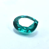 Certified Natural Green Garnet fancy shape placed on a plain white background, 10.25 Ct loose gemstone