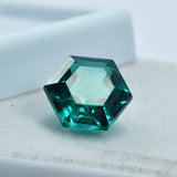 9.10 Ct Green Tsavorite Garnet displayed on a white box, fancy cut loose gemstone, certified and eye-clean