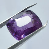 Certified Purple Tanzanite 9.45 Ct Cushion Cut Loose Gemstone Held by Gem Tool