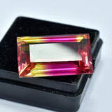 23.20 carat emerald-cut bi-color sapphire, a certified natural loose gemstone