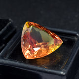 Trillion-cut bi-color sapphire, 15.90 carats, a certified loose gemstone