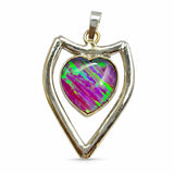 Opal heart pendant with silver and gold frame on a white background