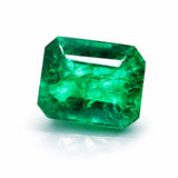 10.63 Ct Natural Green Emerald Certified Loose Gemstone Emerald gemstone on a white background