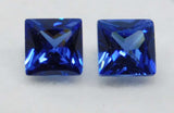 High-quality certified blue sapphire pair, square cut, 7x5 mm size, total weight 2.00 carats.
