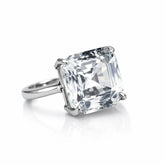 Ring with a large diamond on a white background