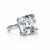 Ring with a large diamond on a white background