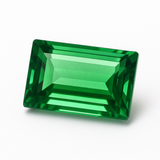 Rectangular green tsavorite garnet gemstone in an emerald cut shown from a front angle.
