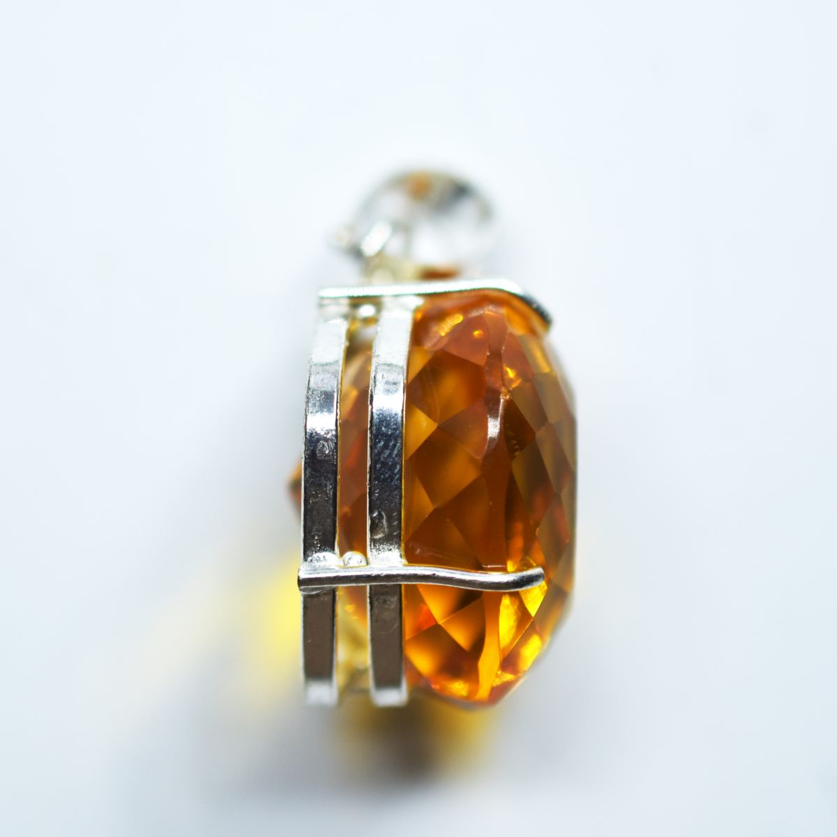 silver topaz pendant India