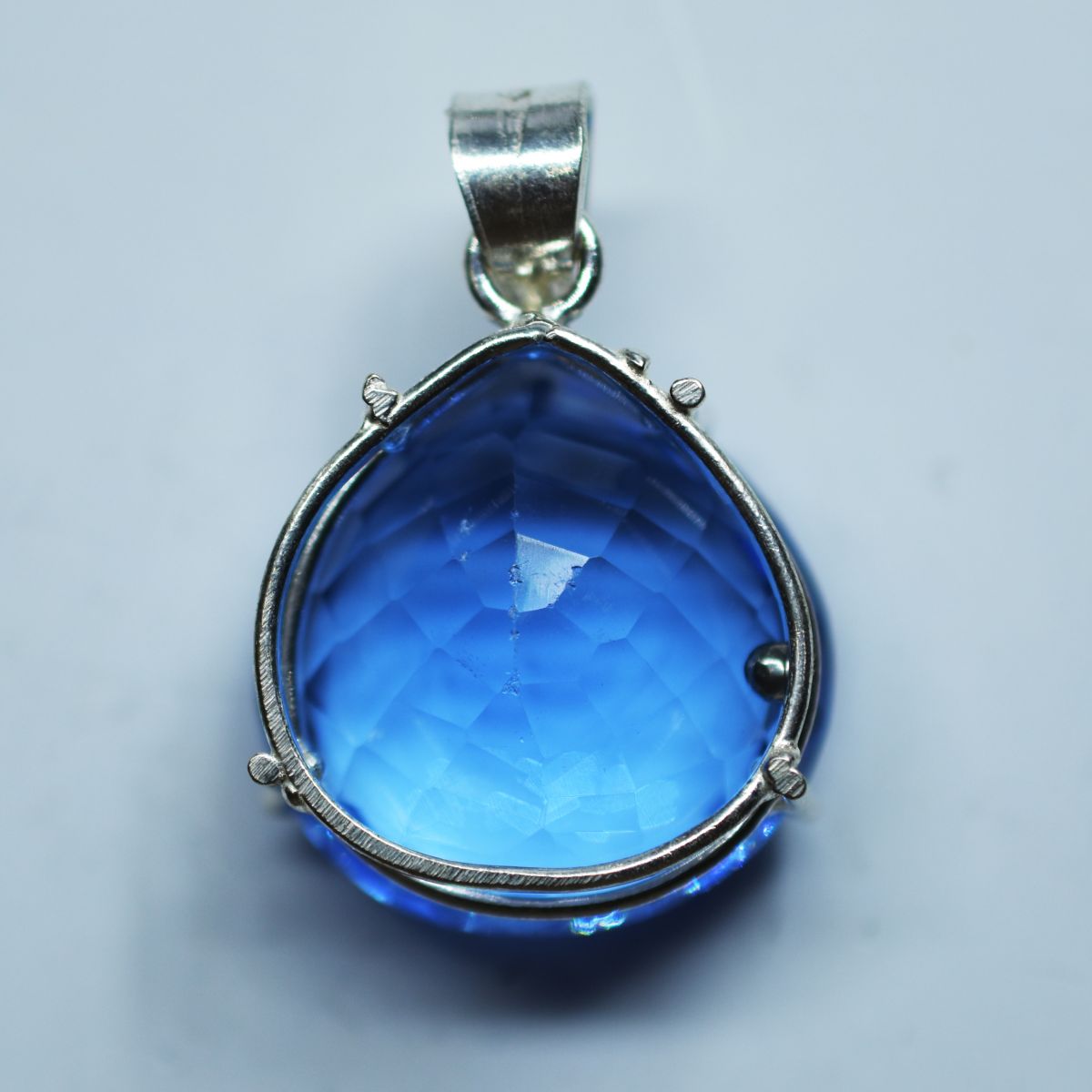 silver topaz pendant India