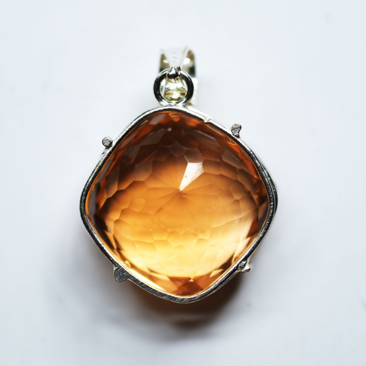 silver topaz pendant India
