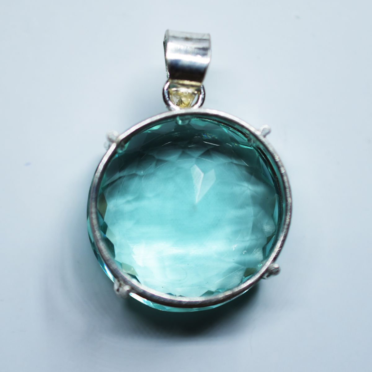 silver topaz pendant India