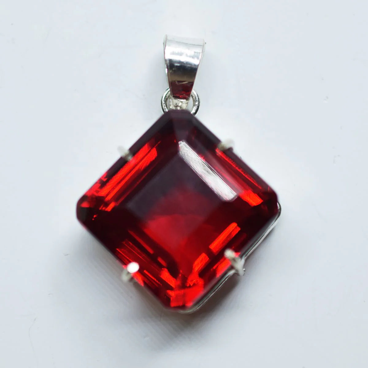 silver topaz pendant India