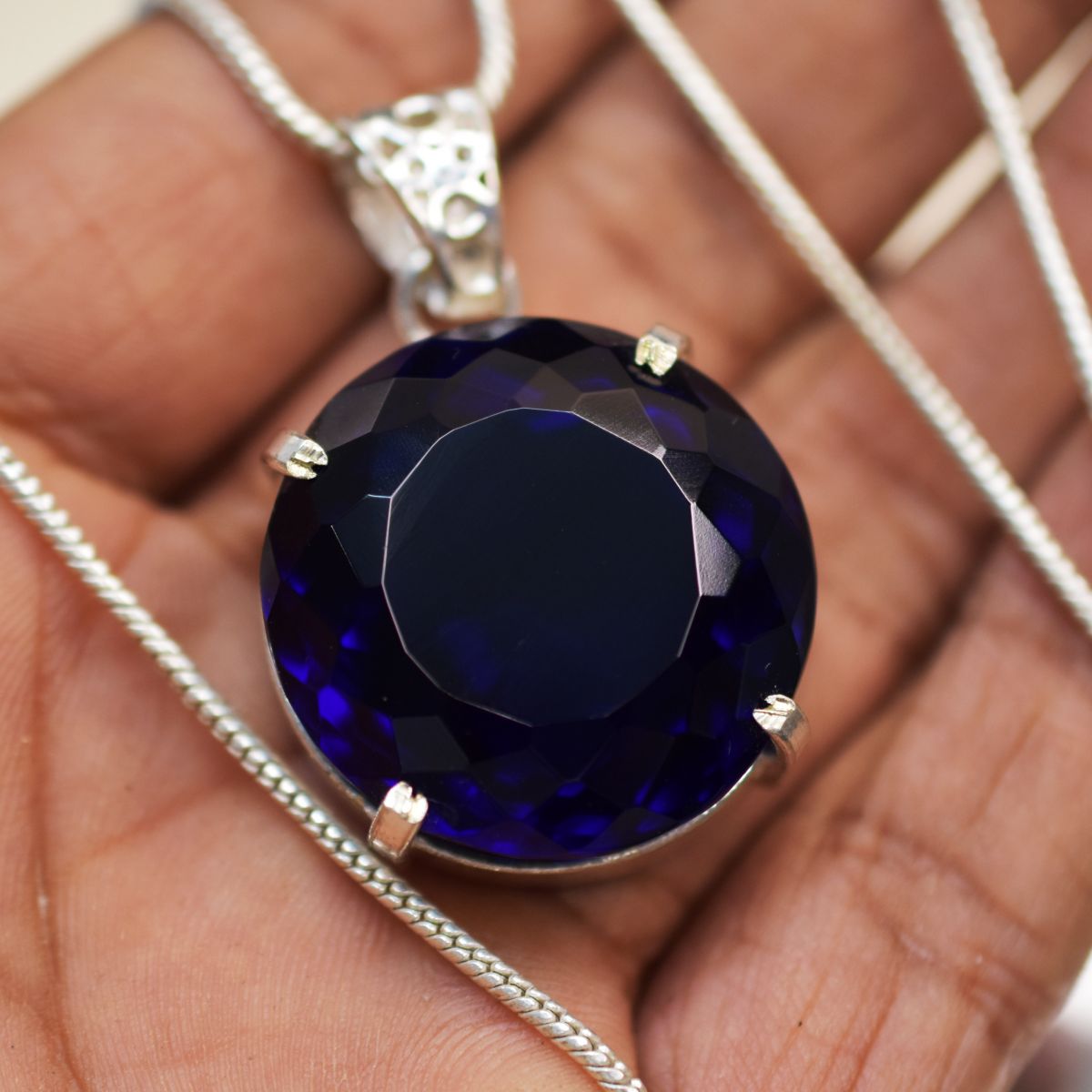 silver topaz pendant India