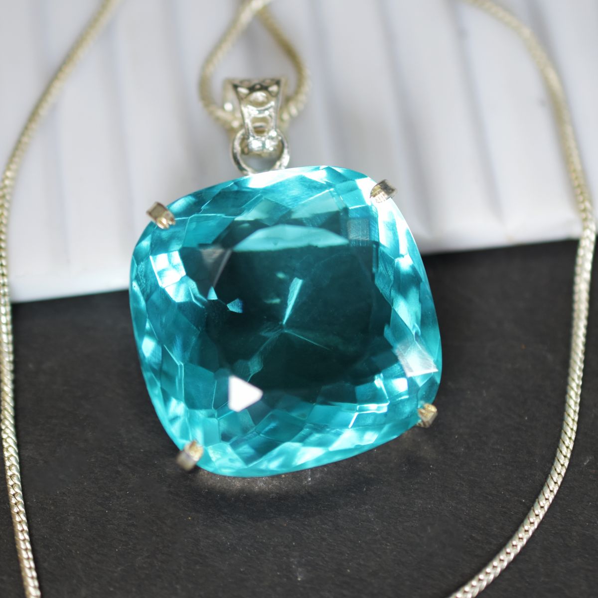 silver topaz pendant India