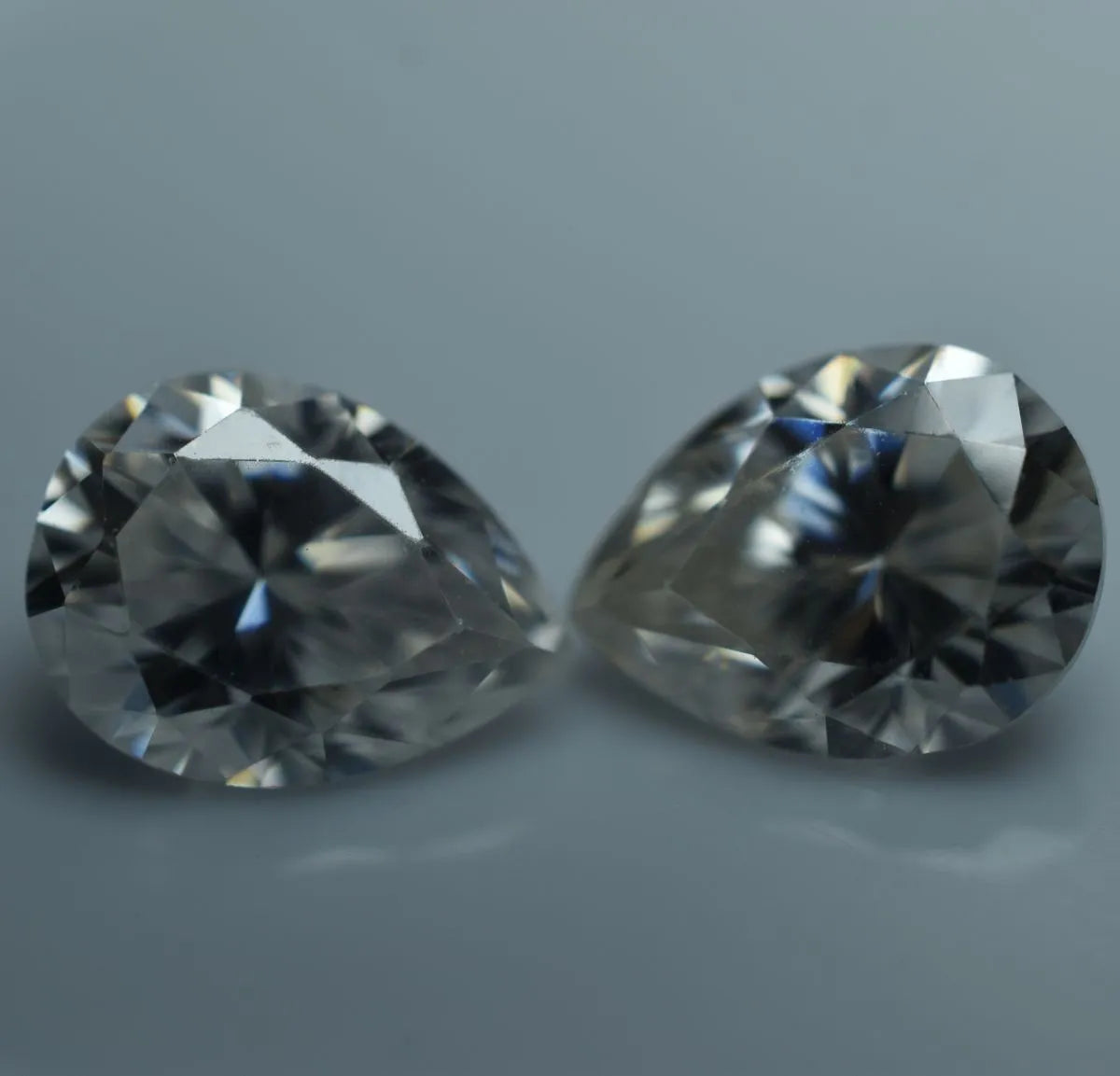 certified moissanite pair pear shape stones