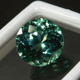 Natural bluish-green grandidierite, 6.50 ct round shape, certified.