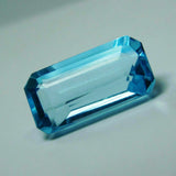 Natural Blue Aquamarine Gemstone 8.01 Carat Emerald Cut Placed on White Background