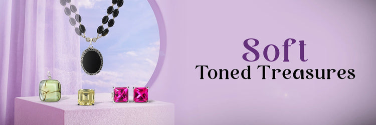 Jewelry on a white stand with 'Soft Toned Treasures' text on a purple background