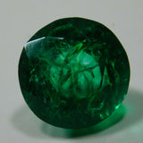 Eye-clean Colombian emerald round cut loose stone display