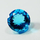 Certified Round Aquamarine 10 Carat Gemstone - Translucent Blue Stone on White Surface